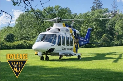 New Jersey State Police helicopter on the landing field at Idylease Helistop
